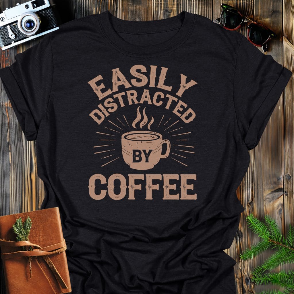 Distracted by Coffee T-Shirt In Black / S Lightweight adventure tee for outdoor lovers Perfect for hiking camping or road trips Made from soft breathable cotton for all-day comfort Ideal for nature lovers and adventurers FAYO Threads outdoor apparel remember Fun Awaits You Outside