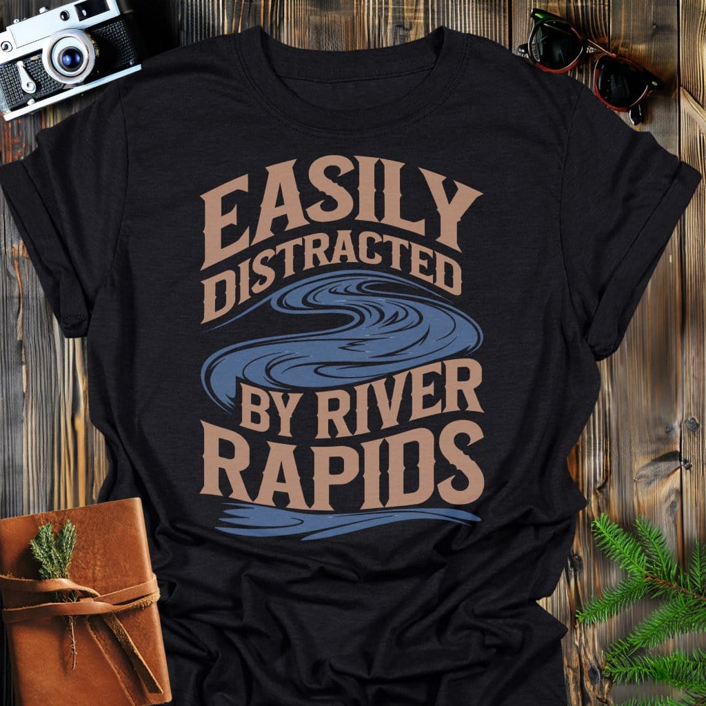 Distracted by Rapids T-Shirt In Black / S Lightweight adventure tee for outdoor lovers Perfect for hiking camping or road trips Made from soft breathable cotton for all-day comfort Ideal for nature lovers and adventurers FAYO Threads outdoor apparel remember Fun Awaits You Outside