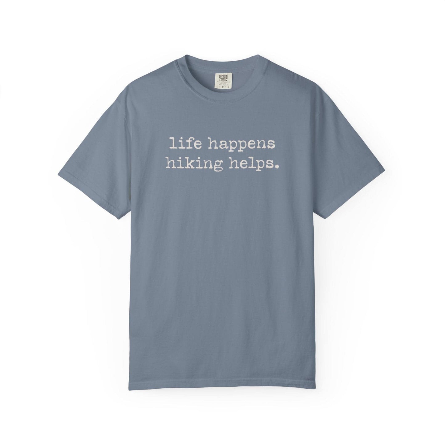 Life Happens Hiking Helps T-Shirt In Blue Jean / S Lightweight adventure tee for outdoor lovers Perfect for hiking camping or road trips Made from soft breathable cotton for all-day comfort Ideal for nature lovers and adventurers FAYO Threads outdoor apparel remember Fun Awaits You Outside