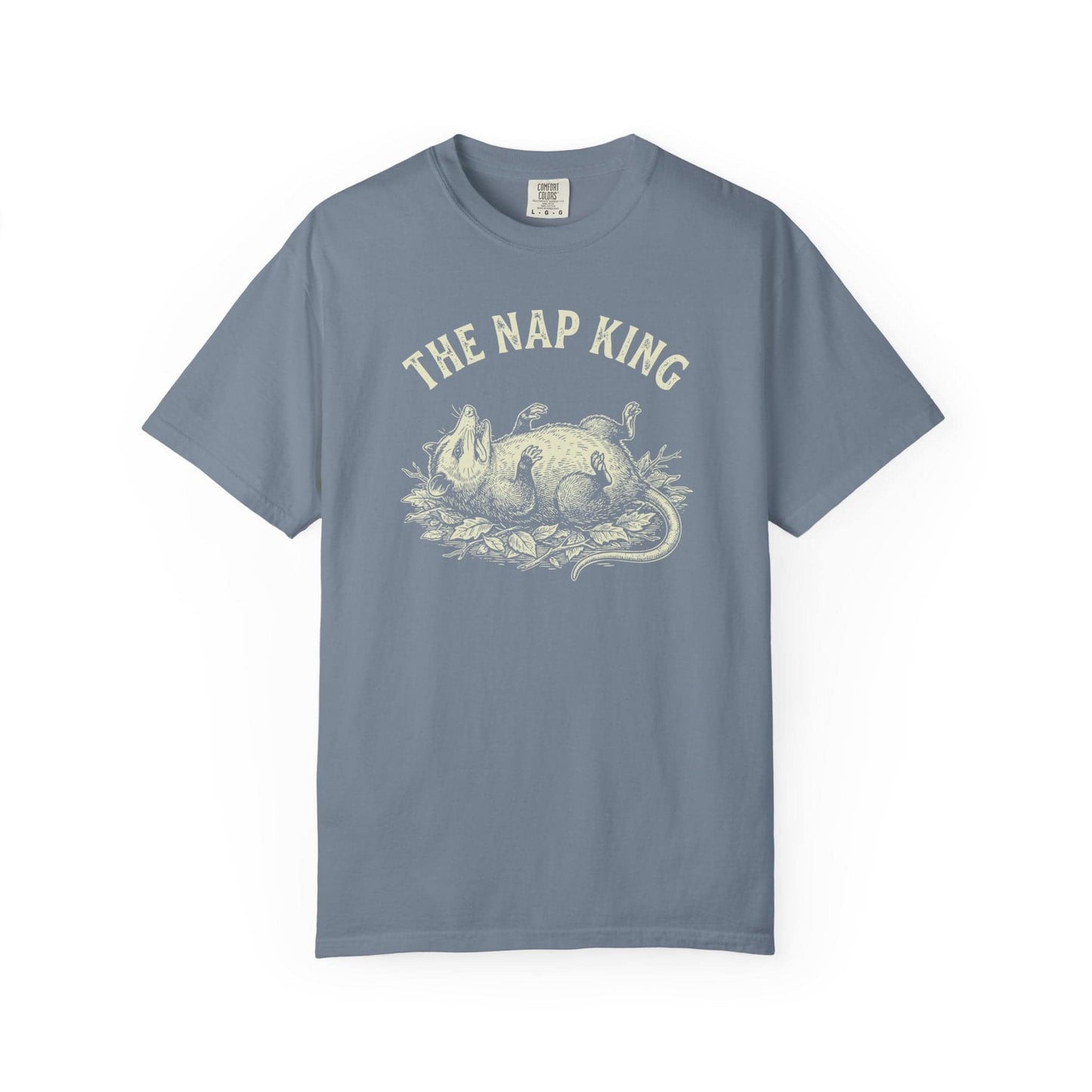 The Nap King T-Shirt In Blue Jean / S Lightweight adventure tee for outdoor lovers Perfect for hiking camping or road trips Made from soft breathable cotton for all-day comfort Ideal for nature lovers and adventurers FAYO Threads outdoor apparel remember Fun Awaits You Outside