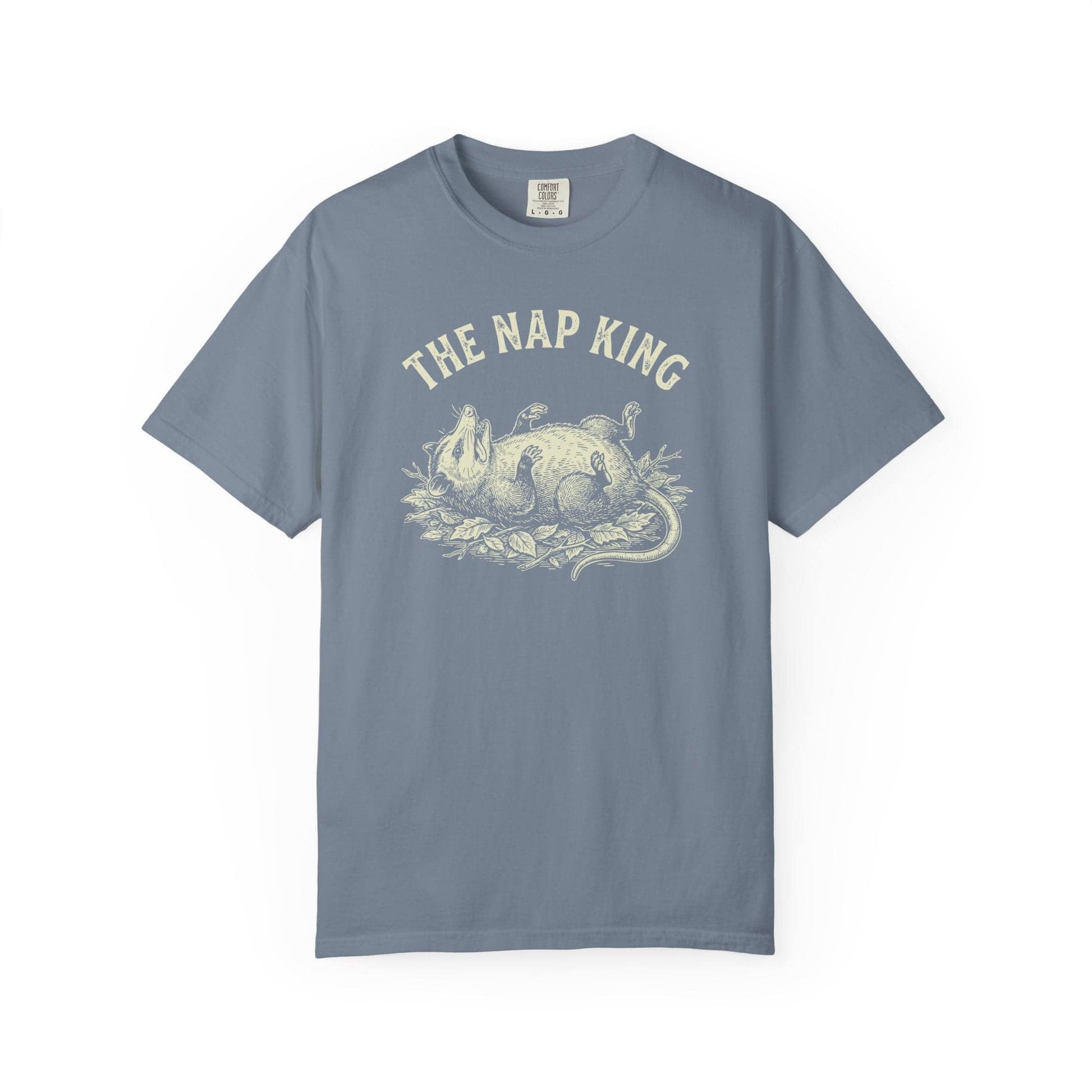 The Nap King T-Shirt In Blue Jean / S Lightweight adventure tee for outdoor lovers Perfect for hiking camping or road trips Made from soft breathable cotton for all-day comfort Ideal for nature lovers and adventurers FAYO Threads outdoor apparel remember Fun Awaits You Outside