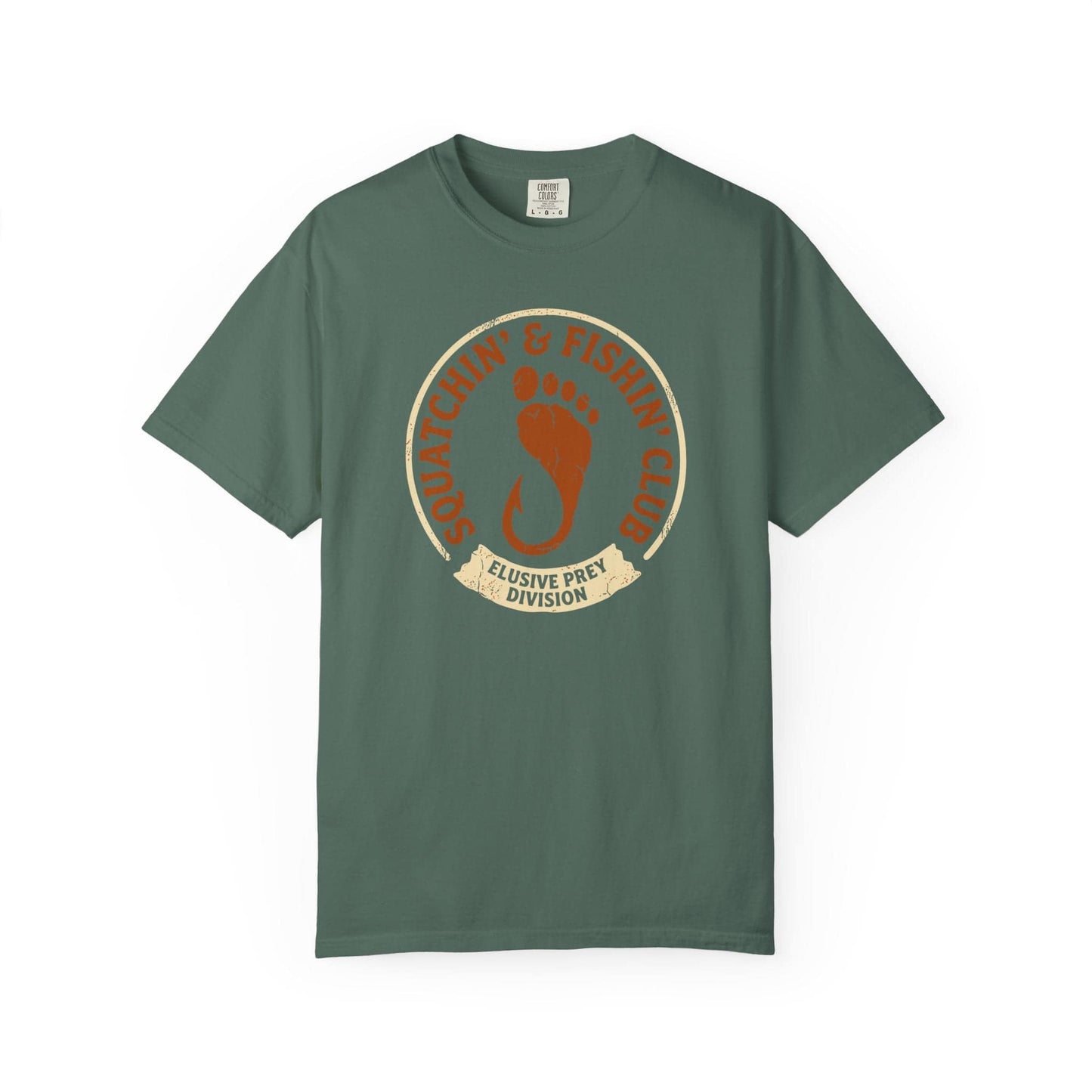 Squatchin' & Fishin' Club T-Shirt In Blue Spruce / S Lightweight adventure tee for outdoor lovers Perfect for hiking camping or road trips Made from soft breathable cotton for all-day comfort Ideal for nature lovers and adventurers FAYO Threads outdoor apparel remember Fun Awaits You Outside