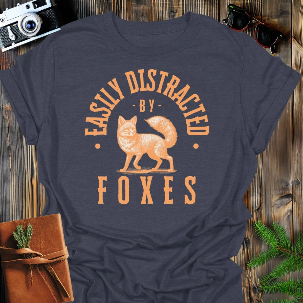 Distracted By Foxes T-Shirt In Dark Heather / S Lightweight adventure tee for outdoor lovers Perfect for hiking camping or road trips Made from soft breathable cotton for all-day comfort Ideal for nature lovers and adventurers FAYO Threads outdoor apparel remember Fun Awaits You Outside