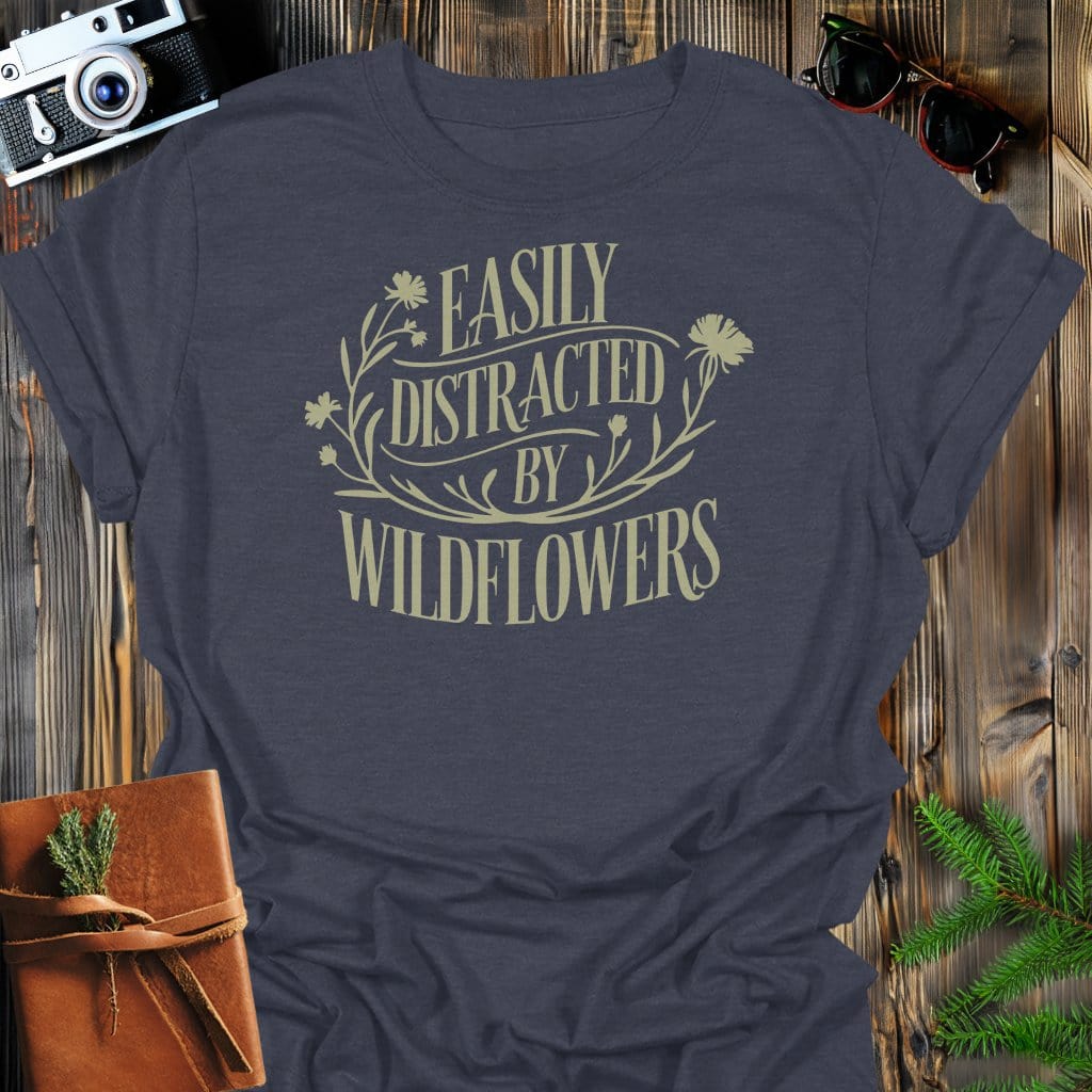 Distracted by Wildflower T-Shirt In Dark Heather / S Lightweight adventure tee for outdoor lovers Perfect for hiking camping or road trips Made from soft breathable cotton for all-day comfort Ideal for nature lovers and adventurers FAYO Threads outdoor apparel remember Fun Awaits You Outside