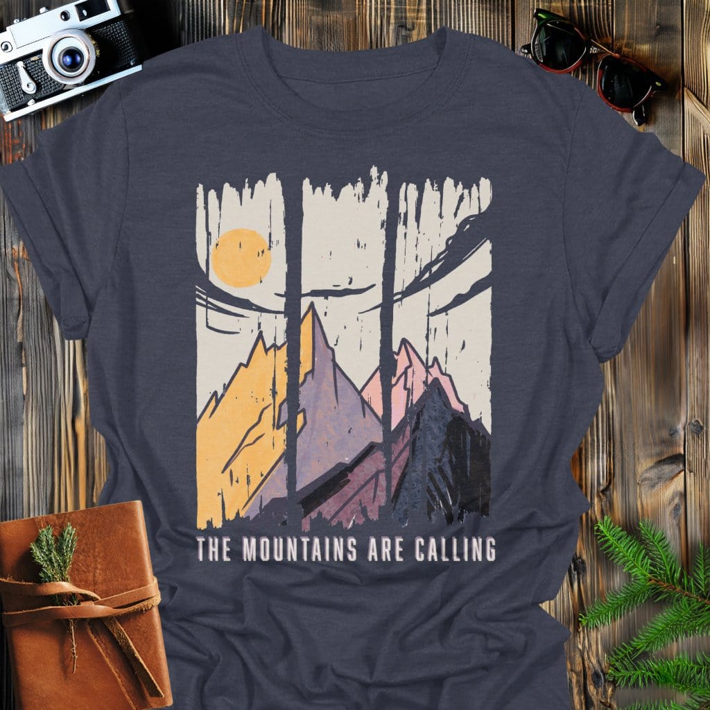 Mountains are Calling T-Shirt In Dark Heather / S Lightweight adventure tee for outdoor lovers Perfect for hiking camping or road trips Made from soft breathable cotton for all-day comfort Ideal for nature lovers and adventurers FAYO Threads outdoor apparel remember Fun Awaits You Outside