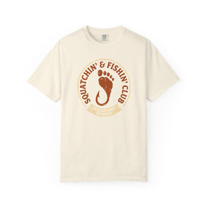 Squatchin' & Fishin' Club T-Shirt In Ivory / S Lightweight adventure tee for outdoor lovers Perfect for hiking camping or road trips Made from soft breathable cotton for all-day comfort Ideal for nature lovers and adventurers FAYO Threads outdoor apparel remember Fun Awaits You Outside