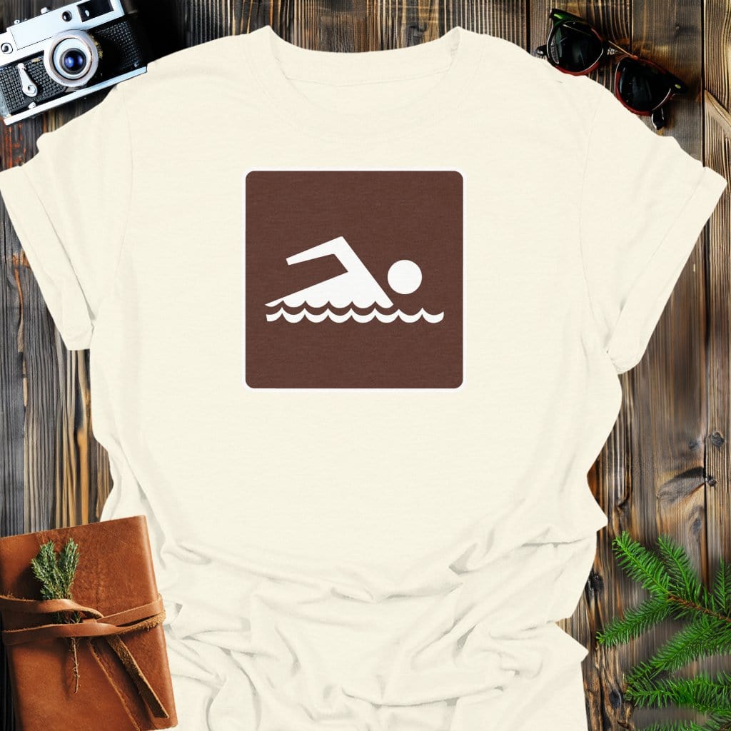 Swimming Sign T-Shirt In Natural / S Lightweight adventure tee for outdoor lovers Perfect for hiking camping or road trips Made from soft breathable cotton for all-day comfort Ideal for nature lovers and adventurers FAYO Threads outdoor apparel remember Fun Awaits You Outside