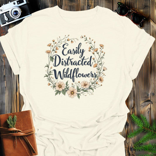 Wildflower Distraction T-Shirt In Natural / S Lightweight adventure tee for outdoor lovers Perfect for hiking camping or road trips Made from soft breathable cotton for all-day comfort Ideal for nature lovers and adventurers FAYO Threads outdoor apparel remember Fun Awaits You Outside