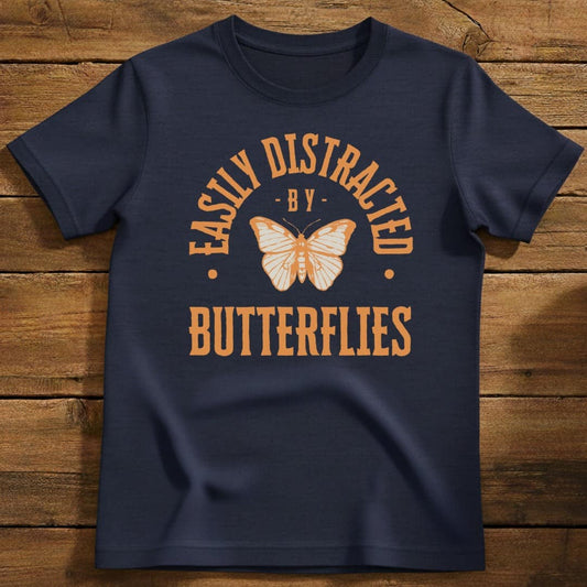 Distracted By Butterflies T-Shirt In Navy / S Lightweight adventure tee for outdoor lovers Perfect for hiking camping or road trips Made from soft breathable cotton for all-day comfort Ideal for nature lovers and adventurers FAYO Threads outdoor apparel remember Fun Awaits You Outside