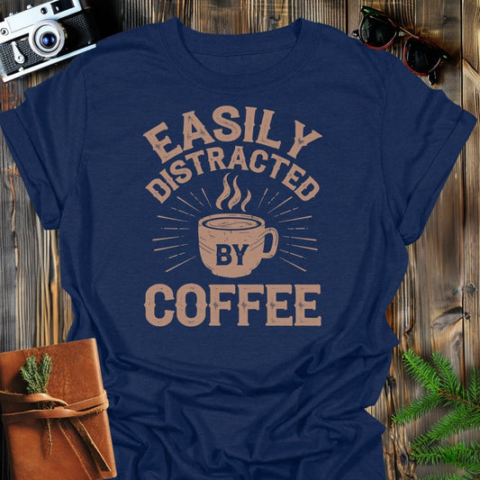 Distracted by Coffee T-Shirt In Navy / S Lightweight adventure tee for outdoor lovers Perfect for hiking camping or road trips Made from soft breathable cotton for all-day comfort Ideal for nature lovers and adventurers FAYO Threads outdoor apparel remember Fun Awaits You Outside