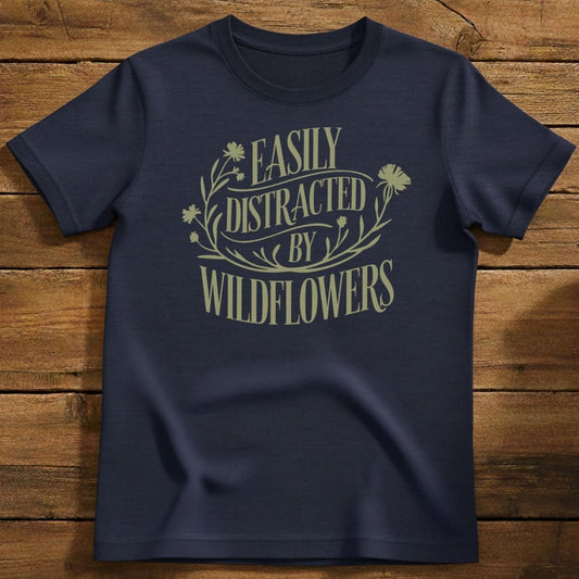 Distracted by Wildflower T-Shirt In Navy / S Lightweight adventure tee for outdoor lovers Perfect for hiking camping or road trips Made from soft breathable cotton for all-day comfort Ideal for nature lovers and adventurers FAYO Threads outdoor apparel remember Fun Awaits You Outside