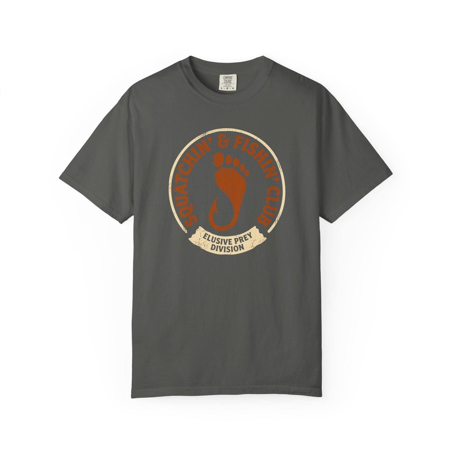 Squatchin' & Fishin' Club T-Shirt In Pepper / S Lightweight adventure tee for outdoor lovers Perfect for hiking camping or road trips Made from soft breathable cotton for all-day comfort Ideal for nature lovers and adventurers FAYO Threads outdoor apparel remember Fun Awaits You Outside