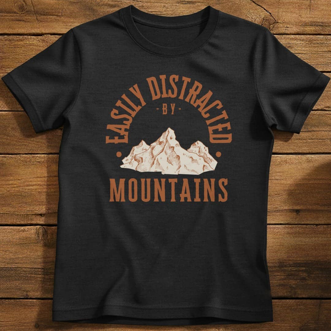 Distracted by Mountains T-Shirt In S / Black Lightweight adventure tee for outdoor lovers Perfect for hiking camping or road trips Made from soft breathable cotton for all-day comfort Ideal for nature lovers and adventurers FAYO Threads outdoor apparel remember Fun Awaits You Outside