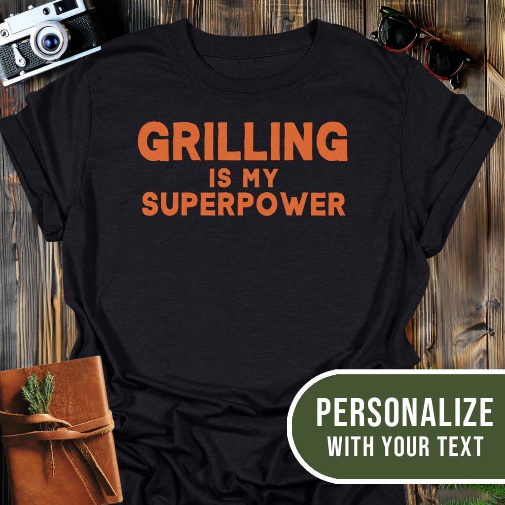 Personalized Grilling Superpower T-Shirt In Black / S Lightweight adventure tee for outdoor lovers Perfect for hiking camping or road trips Made from soft breathable cotton for all-day comfort Ideal for nature lovers and adventurers FAYO Threads outdoor apparel remember Fun Awaits You Outside