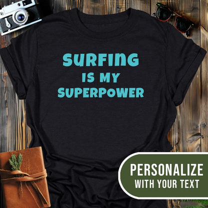 Personalized Surfing Superpower T-Shirt In Black / S Lightweight adventure tee for outdoor lovers Perfect for hiking camping or road trips Made from soft breathable cotton for all-day comfort Ideal for nature lovers and adventurers FAYO Threads outdoor apparel remember Fun Awaits You Outside