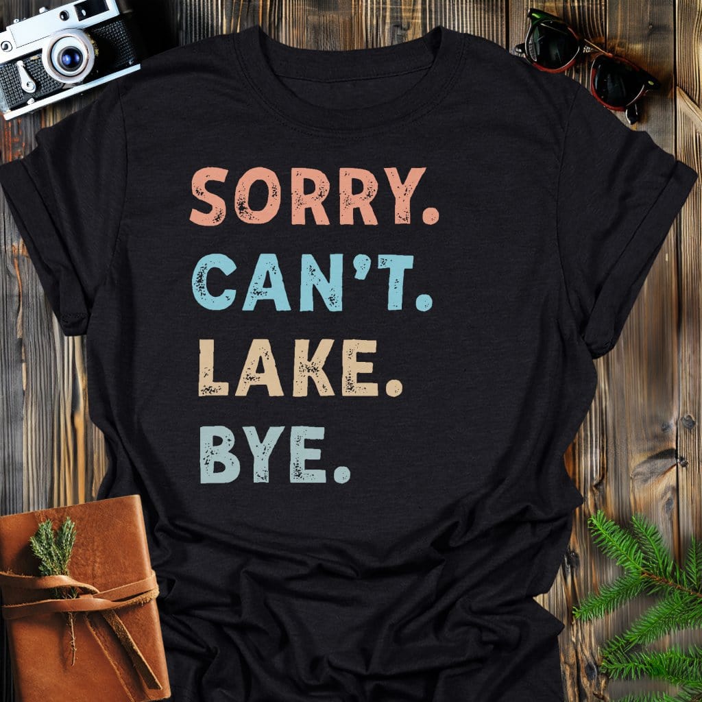 Sorry Can't Lake Bye T-Shirt In Black / S Lightweight adventure tee for outdoor lovers Perfect for hiking camping or road trips Made from soft breathable cotton for all-day comfort Ideal for nature lovers and adventurers FAYO Threads outdoor apparel remember Fun Awaits You Outside