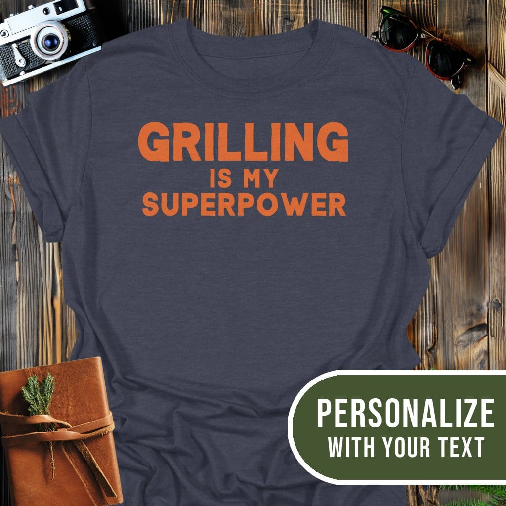 Personalized Grilling Superpower T-Shirt In Dark Heather / S Lightweight adventure tee for outdoor lovers Perfect for hiking camping or road trips Made from soft breathable cotton for all-day comfort Ideal for nature lovers and adventurers FAYO Threads outdoor apparel remember Fun Awaits You Outside