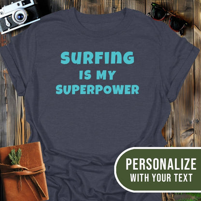 Personalized Surfing Superpower T-Shirt In Dark Heather / S Lightweight adventure tee for outdoor lovers Perfect for hiking camping or road trips Made from soft breathable cotton for all-day comfort Ideal for nature lovers and adventurers FAYO Threads outdoor apparel remember Fun Awaits You Outside