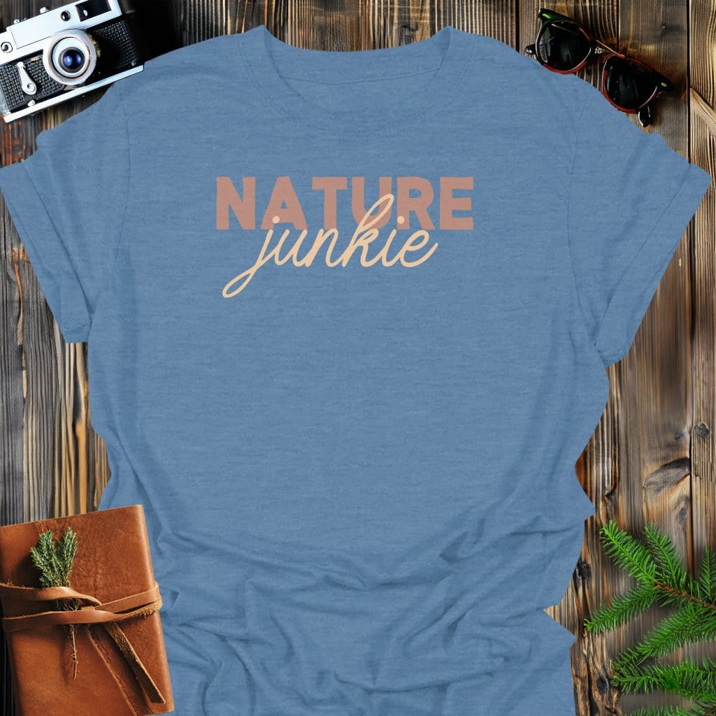 Nature Junkie T-Shirt In Heather Indigo / S Lightweight adventure tee for outdoor lovers Perfect for hiking camping or road trips Made from soft breathable cotton for all-day comfort Ideal for nature lovers and adventurers FAYO Threads outdoor apparel remember Fun Awaits You Outside