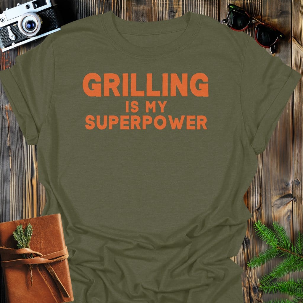 Grilling Superpower T-Shirt In Military Green / S Lightweight adventure tee for outdoor lovers Perfect for hiking camping or road trips Made from soft breathable cotton for all-day comfort Ideal for nature lovers and adventurers FAYO Threads outdoor apparel remember Fun Awaits You Outside