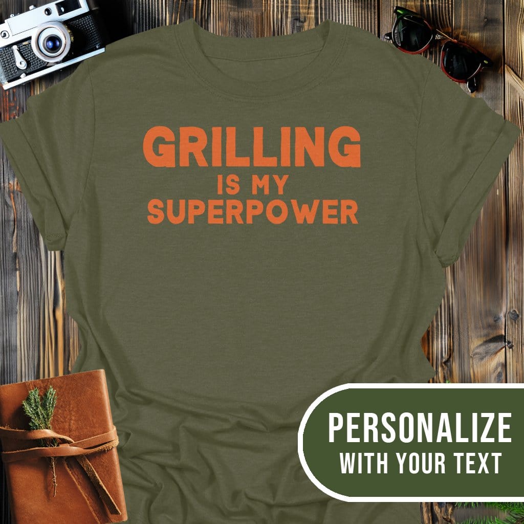Personalized Grilling Superpower T-Shirt In Military Green / S Lightweight adventure tee for outdoor lovers Perfect for hiking camping or road trips Made from soft breathable cotton for all-day comfort Ideal for nature lovers and adventurers FAYO Threads outdoor apparel remember Fun Awaits You Outside