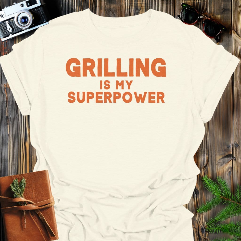 Grilling Superpower T-Shirt In Natural / S Lightweight adventure tee for outdoor lovers Perfect for hiking camping or road trips Made from soft breathable cotton for all-day comfort Ideal for nature lovers and adventurers FAYO Threads outdoor apparel remember Fun Awaits You Outside