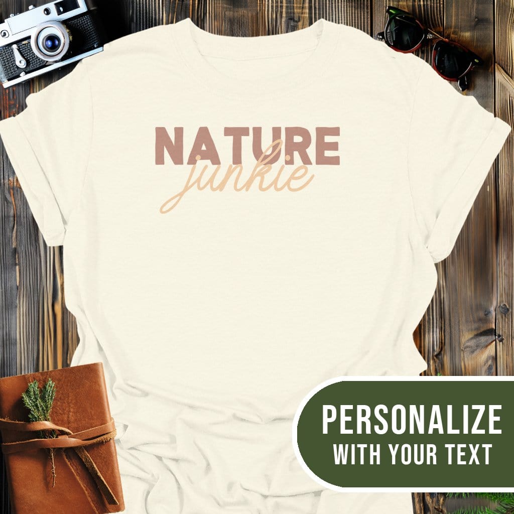 Personalized Nature Junkie T-Shirt In Natural / S Lightweight adventure tee for outdoor lovers Perfect for hiking camping or road trips Made from soft breathable cotton for all-day comfort Ideal for nature lovers and adventurers FAYO Threads outdoor apparel remember Fun Awaits You Outside