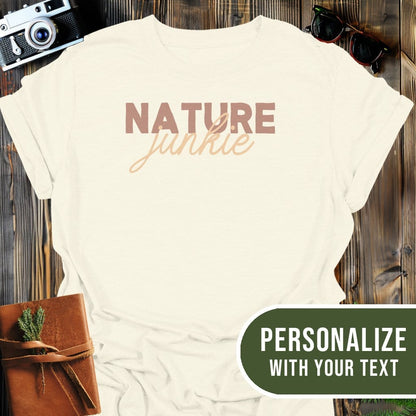 Personalized Nature Junkie T-Shirt In Natural / S Lightweight adventure tee for outdoor lovers Perfect for hiking camping or road trips Made from soft breathable cotton for all-day comfort Ideal for nature lovers and adventurers FAYO Threads outdoor apparel remember Fun Awaits You Outside
