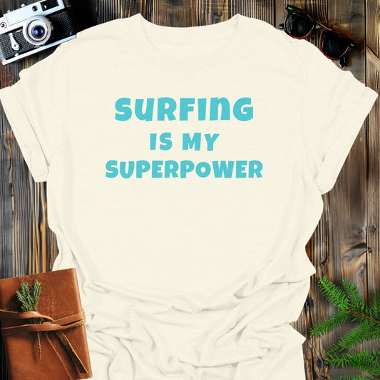 Surfing Superpower T-Shirt In Natural / S Lightweight adventure tee for outdoor lovers Perfect for hiking camping or road trips Made from soft breathable cotton for all-day comfort Ideal for nature lovers and adventurers FAYO Threads outdoor apparel remember Fun Awaits You Outside