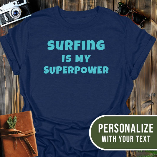 Personalized Surfing Superpower T-Shirt In Navy / S Lightweight adventure tee for outdoor lovers Perfect for hiking camping or road trips Made from soft breathable cotton for all-day comfort Ideal for nature lovers and adventurers FAYO Threads outdoor apparel remember Fun Awaits You Outside