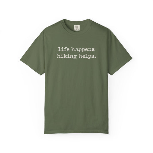 Life Happens Hiking Helps T-Shirt In Sage / S Lightweight adventure tee for outdoor lovers Perfect for hiking camping or road trips Made from soft breathable cotton for all-day comfort Ideal for nature lovers and adventurers FAYO Threads outdoor apparel remember Fun Awaits You Outside