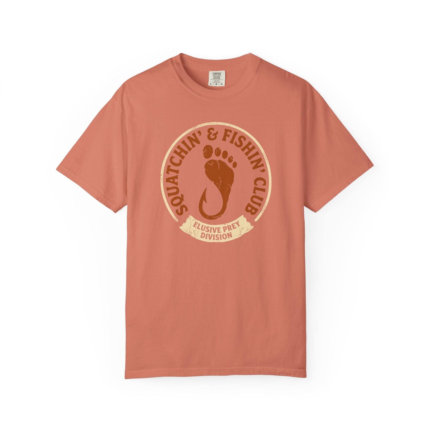 Squatchin' & Fishin' Club T-Shirt In Terracotta / S Lightweight adventure tee for outdoor lovers Perfect for hiking camping or road trips Made from soft breathable cotton for all-day comfort Ideal for nature lovers and adventurers FAYO Threads outdoor apparel remember Fun Awaits You Outside